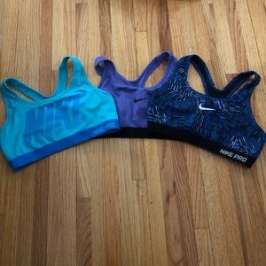 Three Nike sports bras